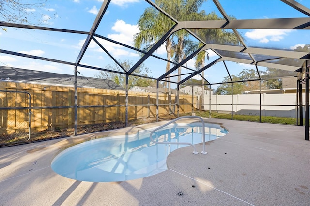 view of pool featuring a lanai and a patio area