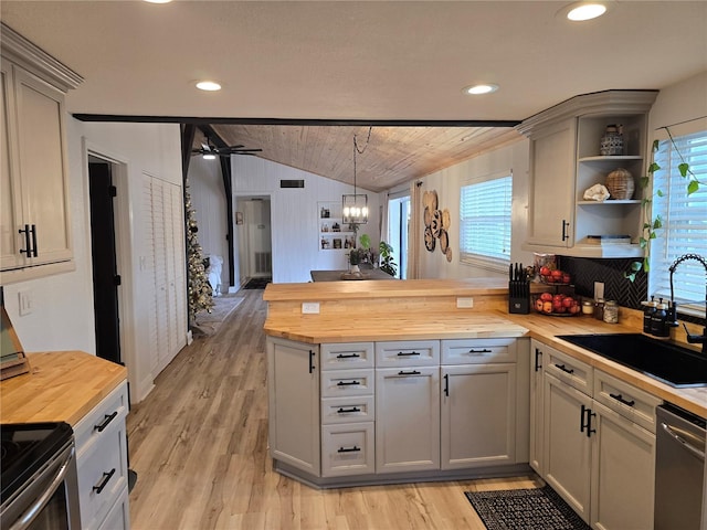 kitchen with wood counters, sink, pendant lighting, dishwasher, and gray cabinets