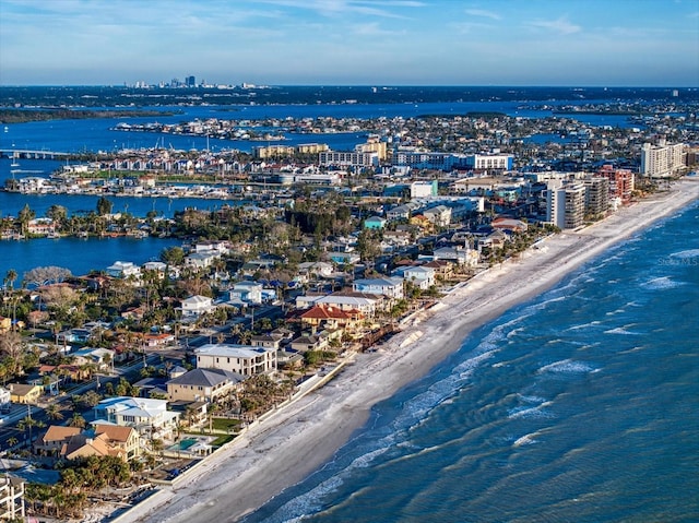 aerial view featuring a view of the beach and a water view