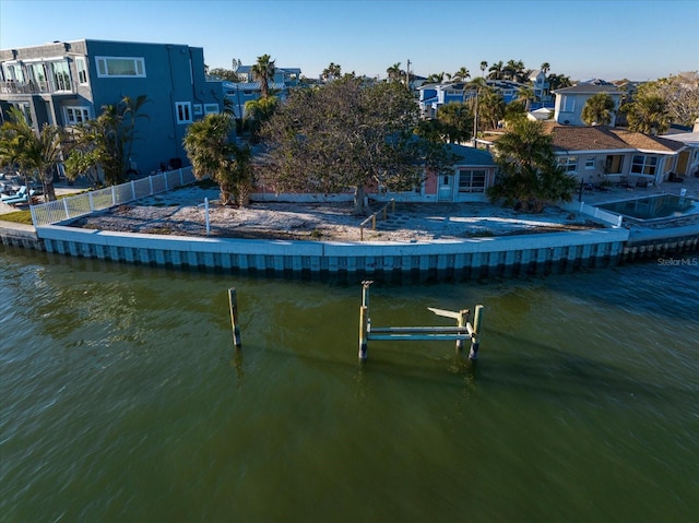 rear view of house with a water view