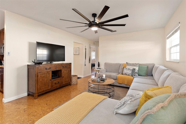 living room with ceiling fan