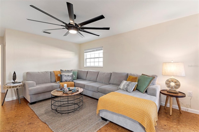 living room featuring ceiling fan