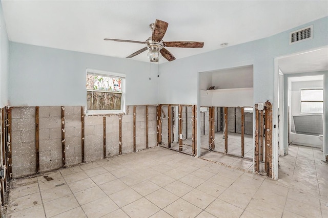 unfurnished room featuring ceiling fan