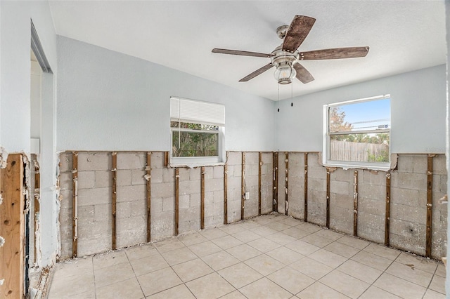 unfurnished room featuring ceiling fan