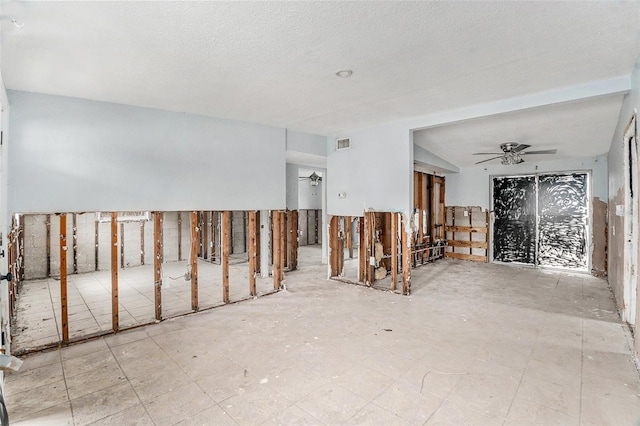 interior space featuring ceiling fan