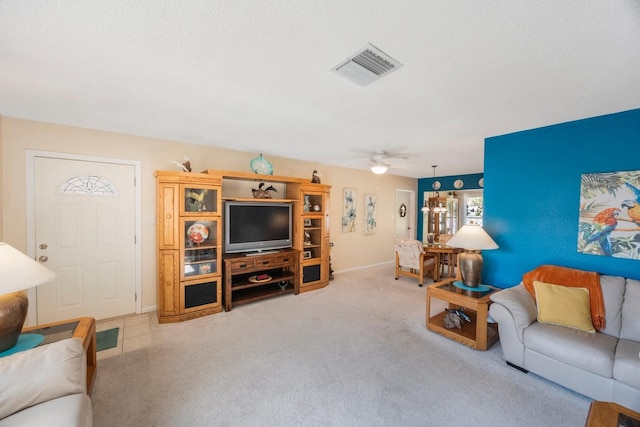 living room featuring ceiling fan