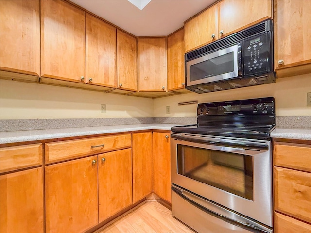 kitchen featuring stainless steel electric stove