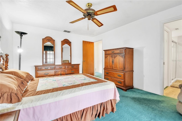 carpeted bedroom with ceiling fan