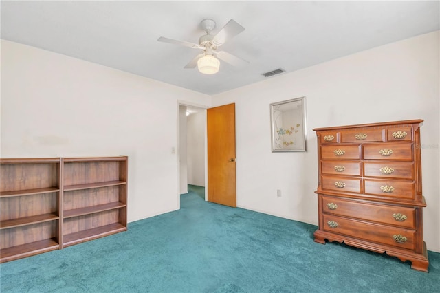 unfurnished bedroom featuring ceiling fan and carpet floors