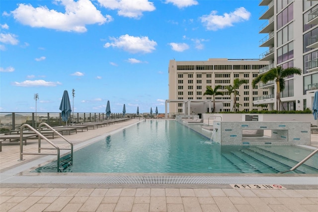 view of swimming pool featuring a patio