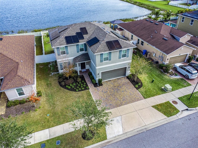 drone / aerial view with a water view