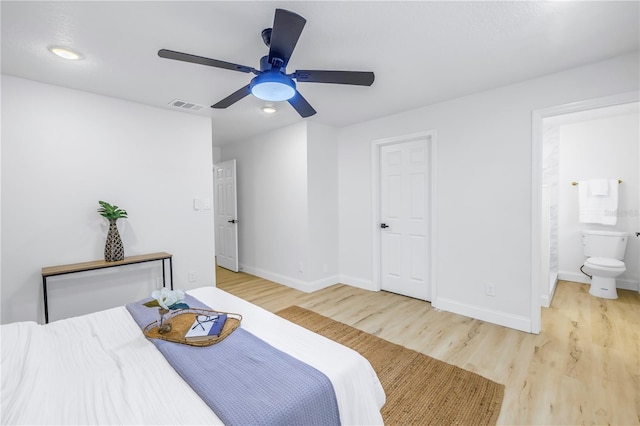 bedroom featuring wood-type flooring, connected bathroom, and ceiling fan