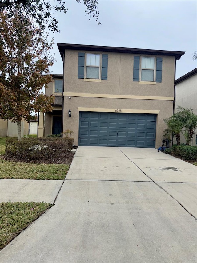 view of property with a garage