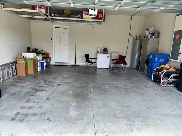 garage featuring a garage door opener, electric panel, and water heater