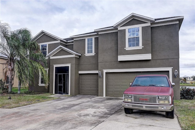 view of front of property with a garage