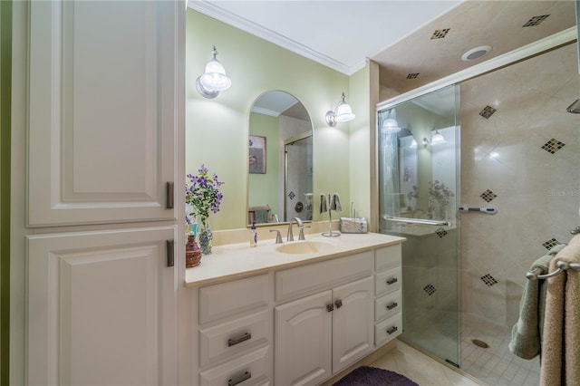 bathroom with an enclosed shower, ornamental molding, tile patterned floors, and vanity