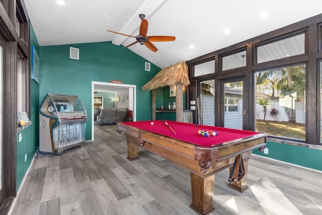 recreation room with vaulted ceiling with beams, ceiling fan, hardwood / wood-style floors, and pool table