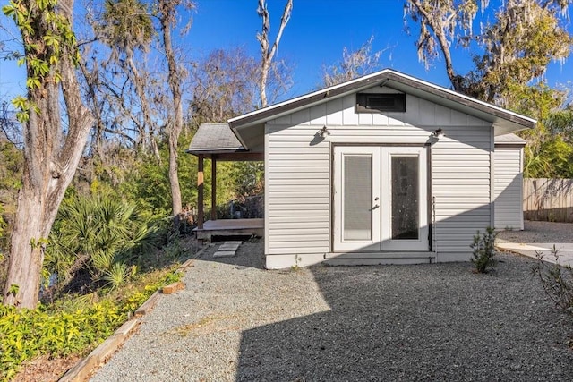 view of outbuilding featuring french doors