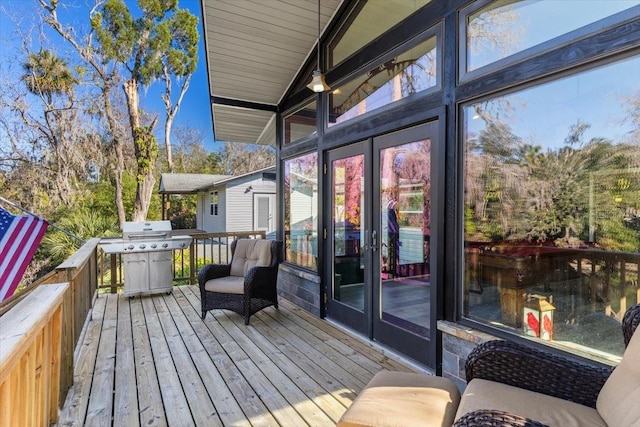 wooden terrace featuring grilling area