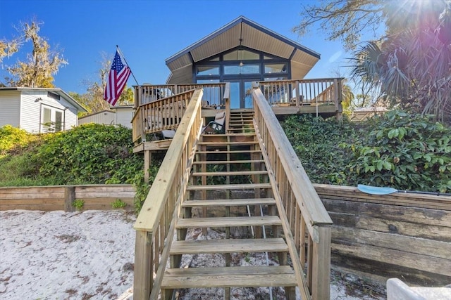 view of jungle gym with a wooden deck