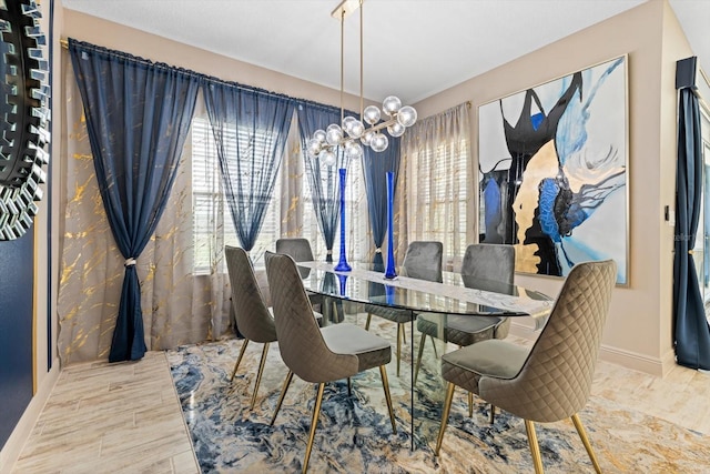 dining area with a chandelier