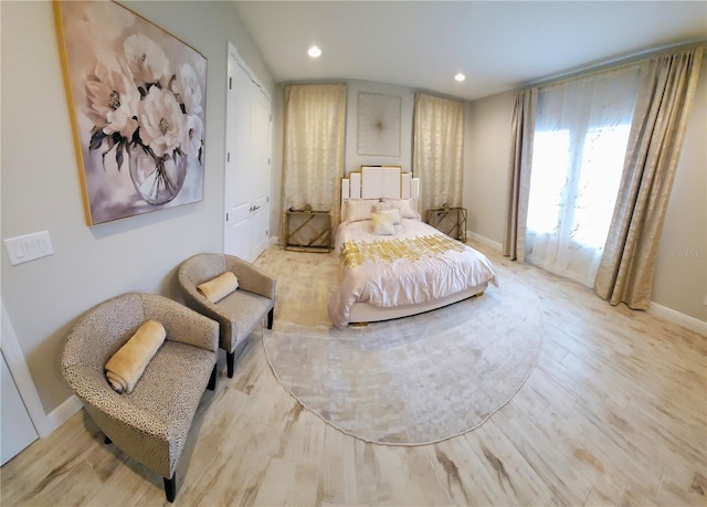 sitting room with light hardwood / wood-style flooring