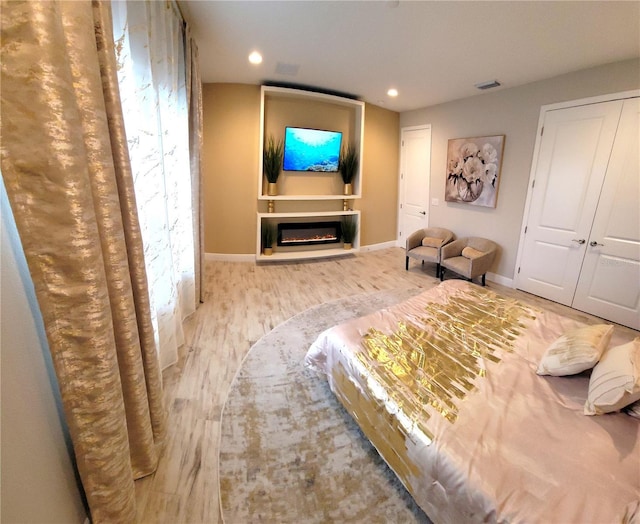 unfurnished bedroom featuring light hardwood / wood-style floors