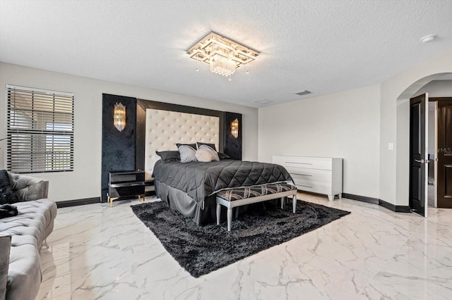 bedroom with a textured ceiling