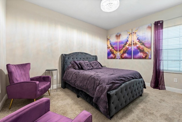 bedroom with light colored carpet