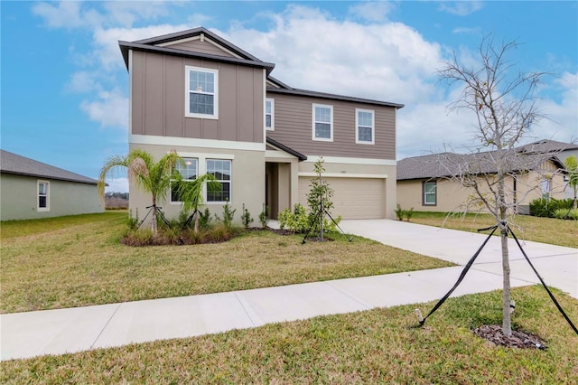 view of front of home featuring a garage and a front lawn