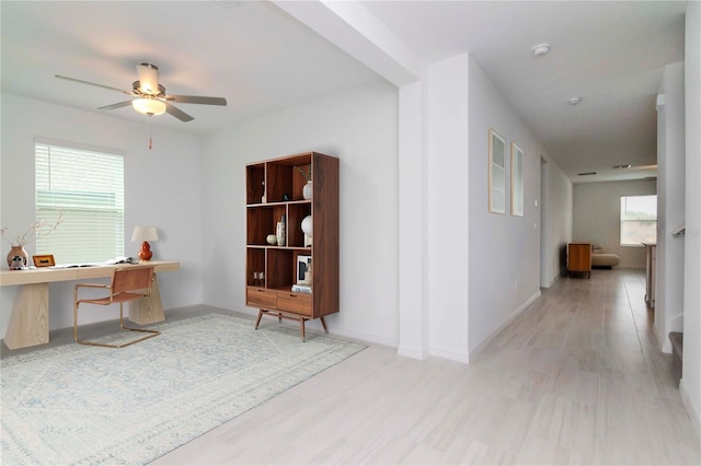 interior space featuring ceiling fan