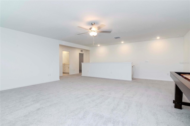 11307 Linden Depot Rd, San Antonio, FL 33576 - recreation room with a ceiling fan, light carpet, and recessed lighting