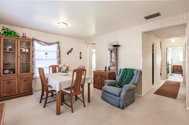 view of carpeted dining space