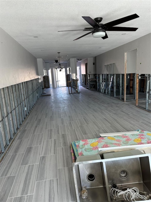 interior space featuring a textured ceiling