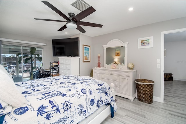 bedroom with ceiling fan and access to exterior