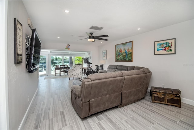 living room featuring ceiling fan