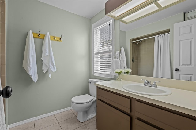 bathroom featuring toilet, plenty of natural light, a shower with curtain, and tile patterned flooring