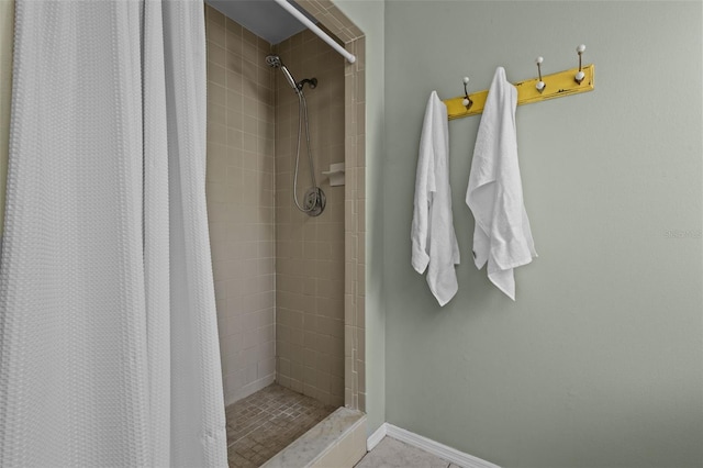 bathroom with a shower with shower curtain