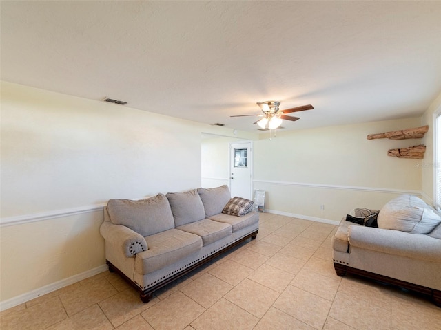 living room featuring ceiling fan