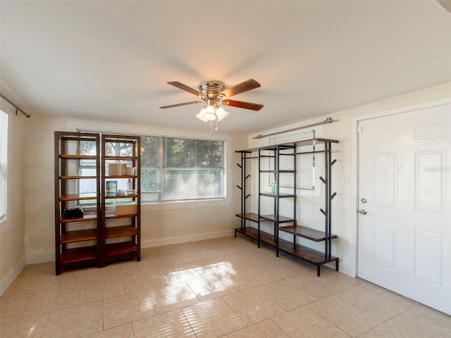 spare room featuring ceiling fan