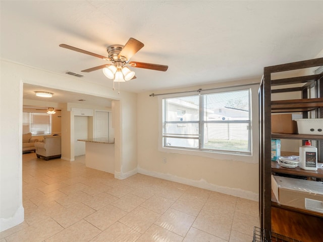 empty room featuring ceiling fan