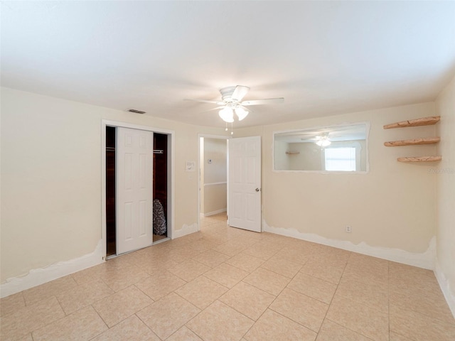 empty room featuring ceiling fan