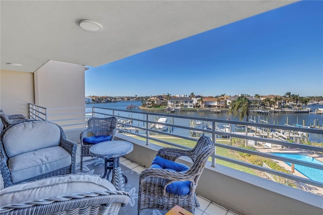 balcony featuring a water view