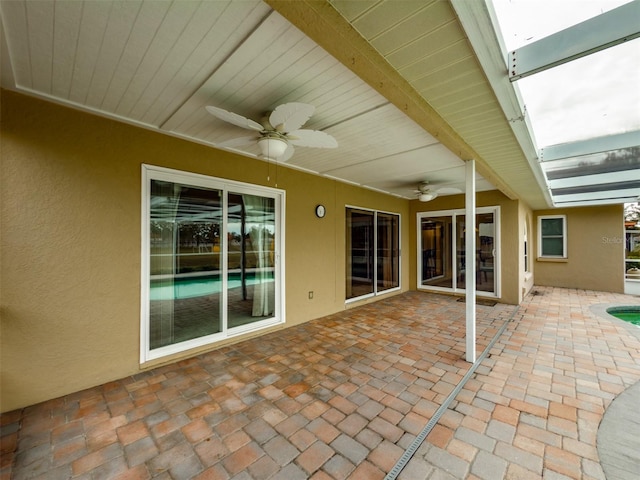 view of patio / terrace featuring ceiling fan