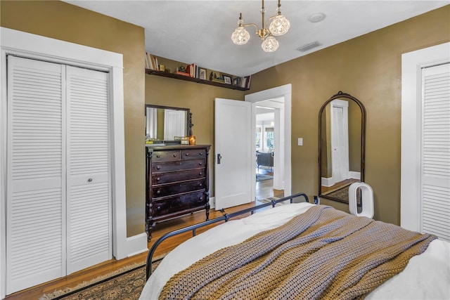 bedroom featuring a chandelier