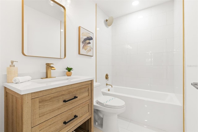 full bathroom featuring vanity, toilet, and tiled shower / bath