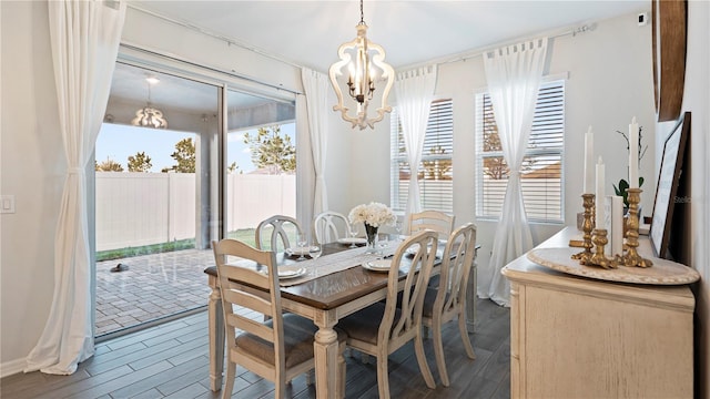 dining room with a notable chandelier