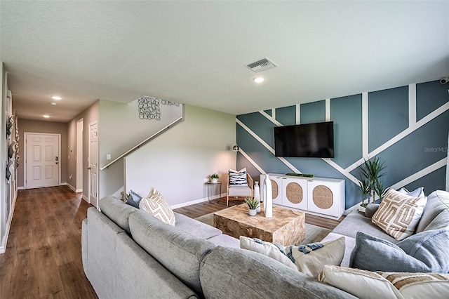 living room featuring dark wood-type flooring