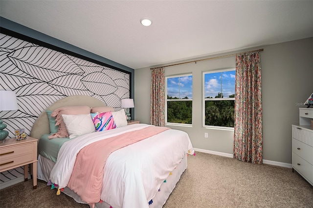 bedroom featuring light colored carpet