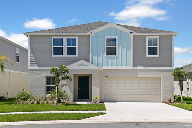 view of front of property with a garage